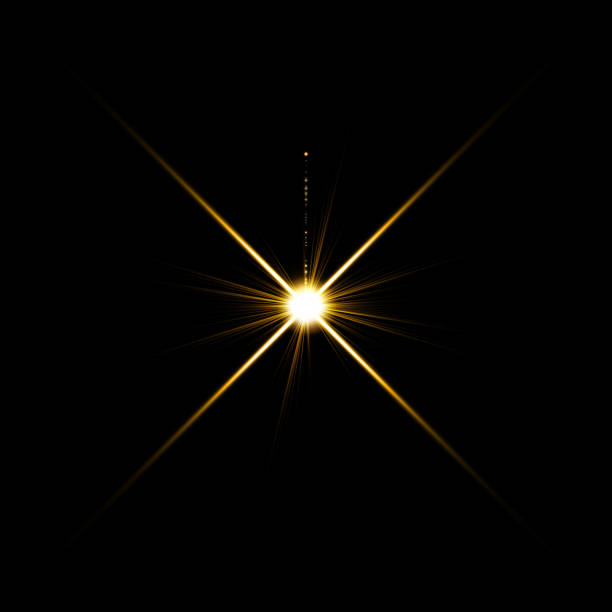 istock Gold warm color bright lens flare flashes leak for transitions on black background 1255368566