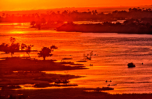 Sunset over the Amazon river, located in the state of Amazonas, in Brazil.