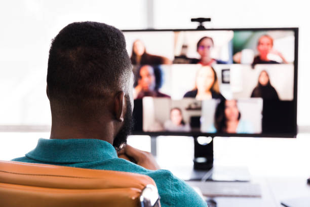 istock Business people participate in virtual meeting 1255371690