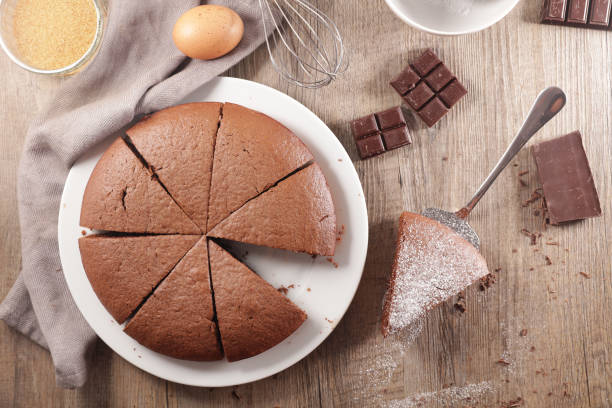 istock delicious chocolate cake sliced and ingredient 1255372839
