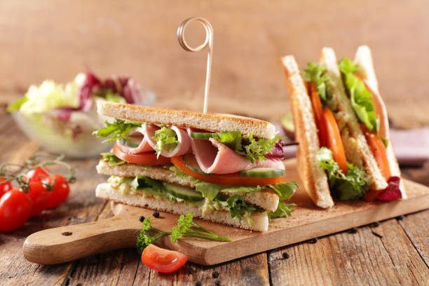 istock club sandwich with ham, lettuce, cucumber and tomato 1255376104