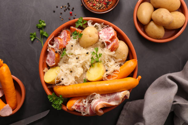 istock sauerkraut, choucroute with sausage, bacon, potato and cabbage 1255376199