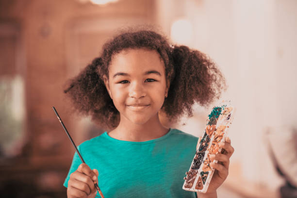 istock Children, learn painting with coloring book 1255376820