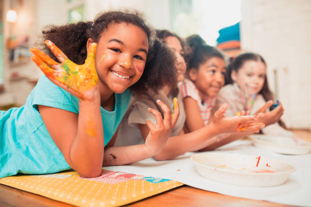 istock Children, learn painting with coloring book 1255377578