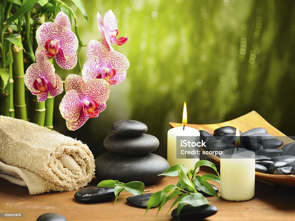 spa concept zen basalt stones and bamboo on the wood.Others spa teme in this lightbox http://www.istockphoto.com/file_search.php?action=file&lightboxID=7989999 Alternative Medicine Stock Photo