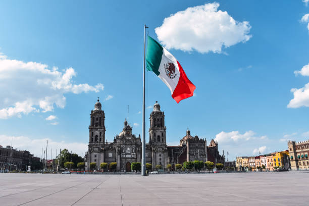 Zocalo square and metropolitan cathedral in the historic center of Mexico City Zocalo square and metropolitan cathedral in the historic center of Mexico City mexican flag stock pictures, royalty-free photos & images