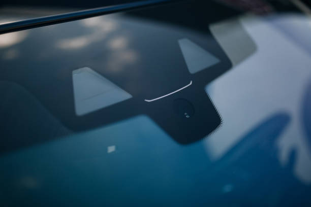 rain and light sensor on the windshield of the car - cold tint imagens e fotografias de stock
