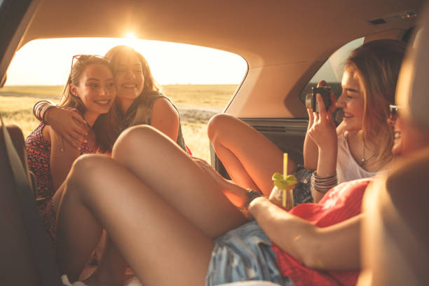 istock Picture time during sunset for friends durind road trip 1255382332