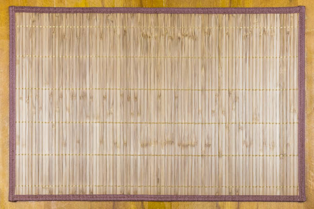 istock Bamboo napkin with a frame of material, texture, top view, background. 1255385092