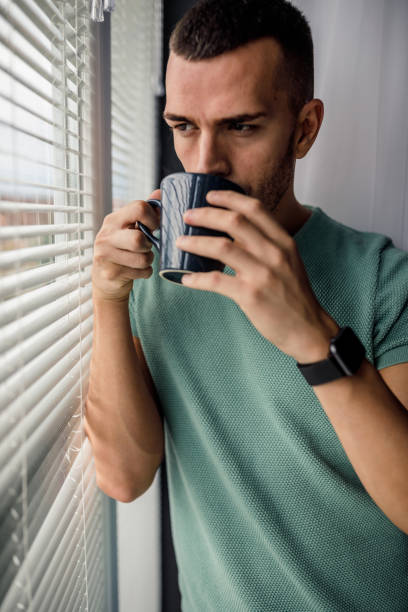 istock A sip of coffee by the window 1255385701