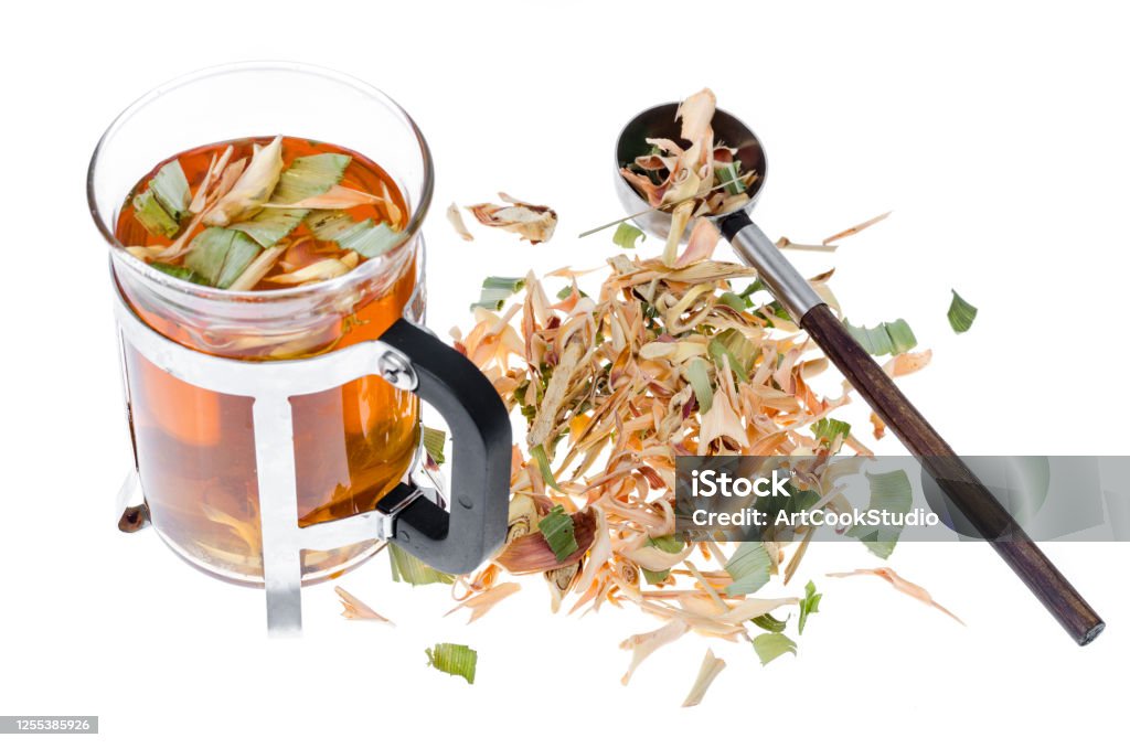 Glass with herbal tea from dried plants, alternative medicine Glass with herbal tea from dried plants, alternative medicine. Studio Photo Alternative Medicine Stock Photo