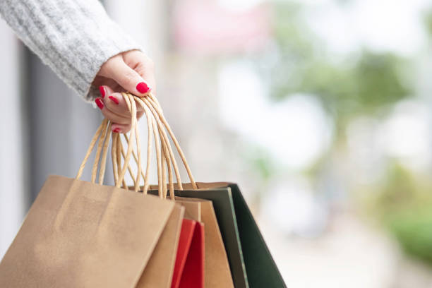 istock A woman is shopping at the mall 1255388331