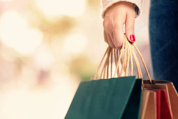 istock A woman is shopping at the mall 1255388332