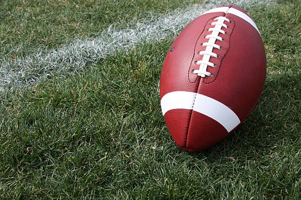 istock American Football on the Grass 125538891