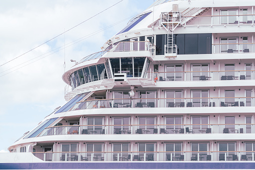 Belfast, Northern Ireland, United Kingdom - July 5, 2020: The profile of the bow decks of a small cruise ship (1,400 passengers and crew), the MV Viking Sky, operated by Viking Cruises.  It is moored at the shipyards of Harland and Wolff for a refit.  Built in 2017, the ship experienced engine failure in March 2019 off the coast of Norway during a storm, necessitating a MayDay call and the airlift of passengers.