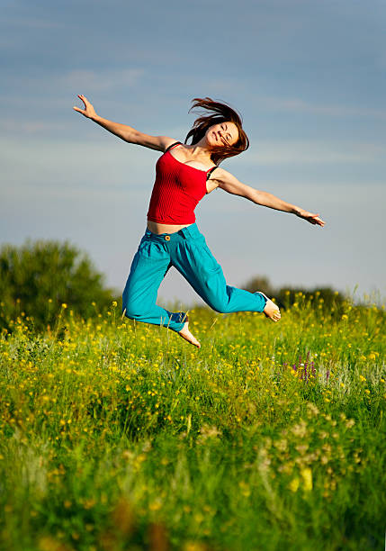 istock Woman jumping on a sunset 125539843