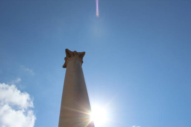 Pompey`s Pillar or Serapeum pillar is the name given to a Roman triumphal column in Alexandria, Egypt. Set up in honour of the augustus Diocletian between 298-302 AD, the giant Corinthian column originally supported a colossal porphyry statue of the emperor in armour. It stands at the eastern side of the temenos of the Serapeum of Alexandria, beside the ruins of the temple of Serapis itself. The erroneous name and association with Pompey stems from historical misreading of the Greek dedicatory inscription on the base