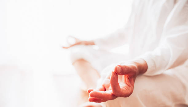 istock Woman practicing yoga lesson 1255399560
