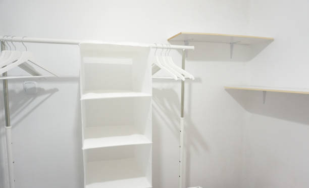 istock white wardrobe new coat rack without doors 1255402859