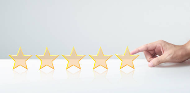 istock Hand of touching rise on increasing five stars. Increase rating evaluation classification concept 1255404338