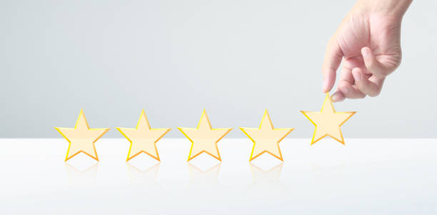 istock Hand of touching rise on increasing five stars. Increase rating evaluation classification concept 1255404350