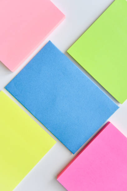 istock selective focus, bright colorful square blocks and blue rectangle in the center 1255408961