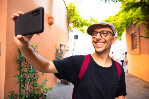 istock Men Using Smartphone In The City - Tourist Visit Italy 1255409122