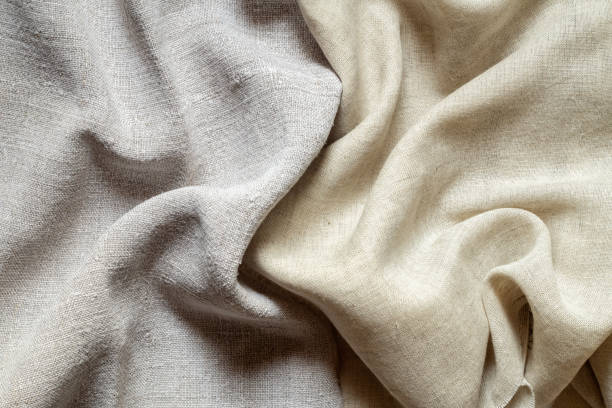istock Texture of old homespun and modern factory linen fabrics 1255409191