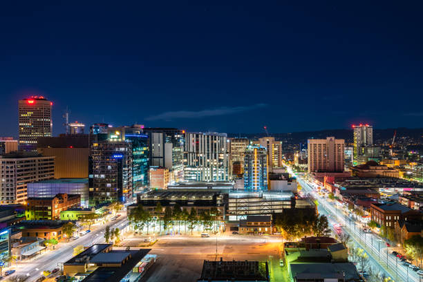 Adelaide CBD skyline illuminated at night Adelaide, South Australia - June 5, 2020: Adelaide CBD skyline illuminated at night viewed towards east south australia photos stock pictures, royalty-free photos & images