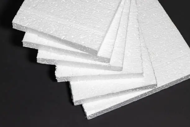 Photo of Styrofoam. Sheets of Factory manufacturing.