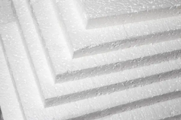 Photo of Styrofoam. Sheets of Factory manufacturing.