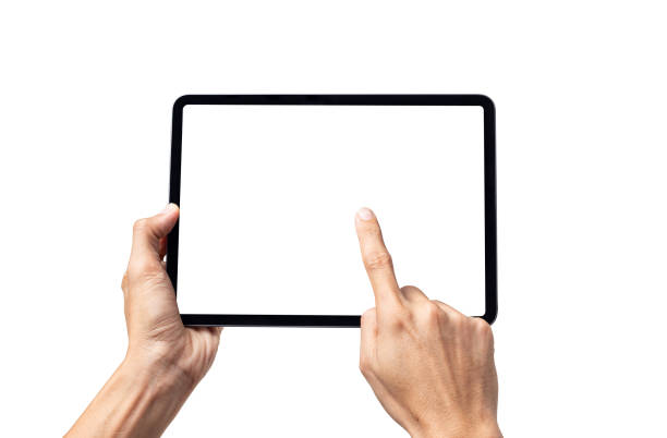 Hand man holding tablet with mockup blank screen isolated on white background with clipping path stock photo