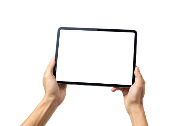 istock Hand man holding tablet with mockup blank screen isolated on white background with clipping path 1255413330