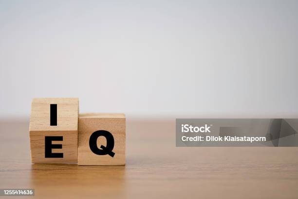 Flipping Of Eq To Iq Which Print Screen On Wooden Cube Block Smart Idea And Smart Emotion Concept Stock Photo - Download Image Now