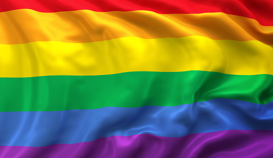 Rainbow flag blowing in the wind. Full page LGBT flying flag. 3D illustration.