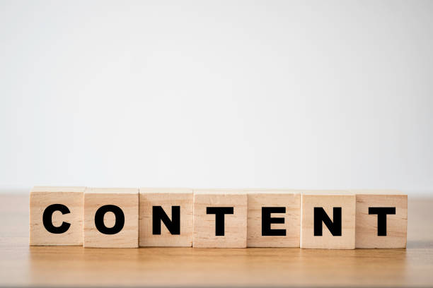 istock Wooden cubes block which print screen content wording on the table. Creative business marketing concept. 1255416134