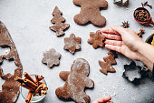 Woman preparing Christmas gingerbread cookies