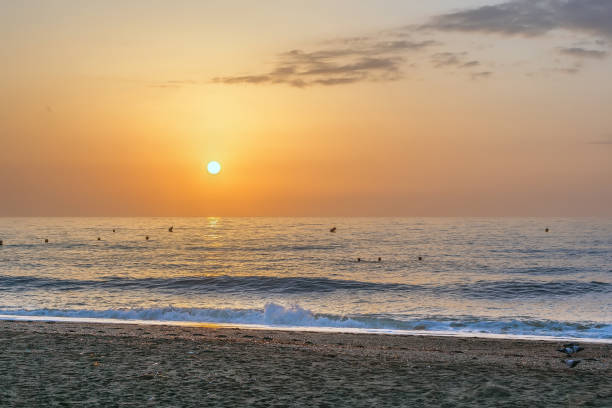 istock Sunset on the beach in Torremolinos, Spain 1255431856