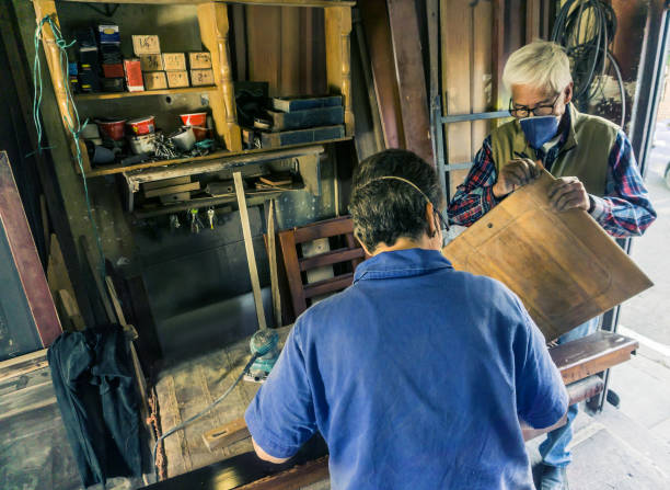 Casings for round metal stoves and fireplaces in a small workshop