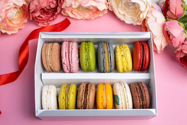 istock colorful modern macaroons in gift box on pink celebration romantic party birthday 1255434274