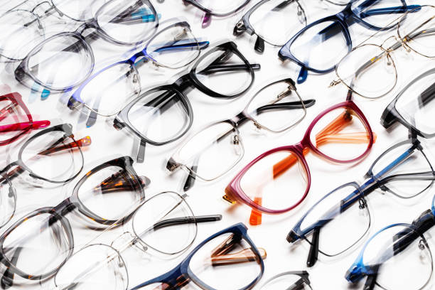 istock Full Frame Shot Of Eyeglasses Over White Background 1255438535