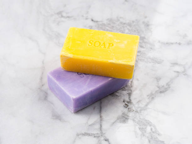 istock Lemon and lavender artisanal soap bars on marble 1255440281