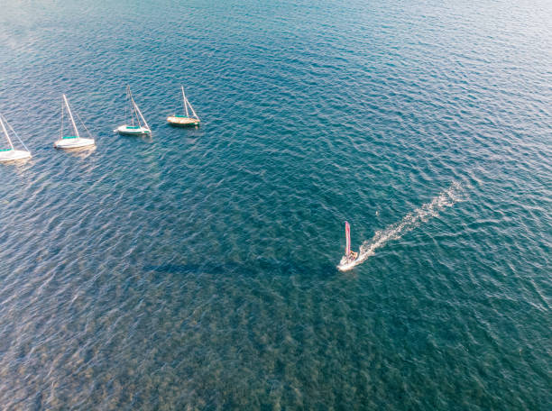 istock Aerial View Windsurfing on the Sea 1255441581