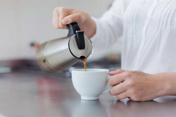 istock Woman serving fresh delicious coffee 1255442405