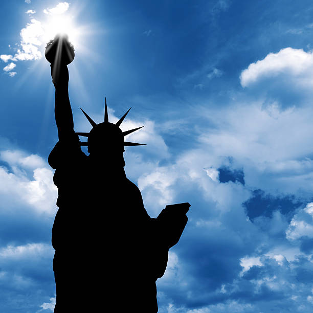 istock statue of liberty and  sunshine 125544371