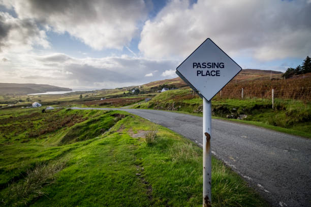 Passing place sign with Scottish countryside stock photo