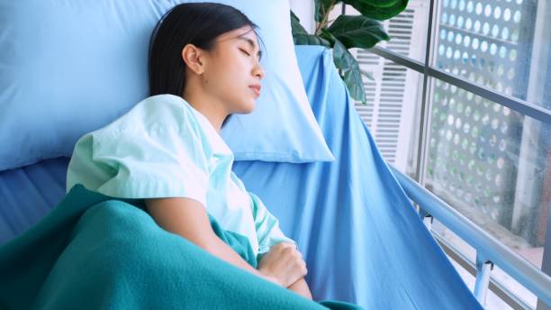 istock Happy patient getting well improvement at hospital 1255443923