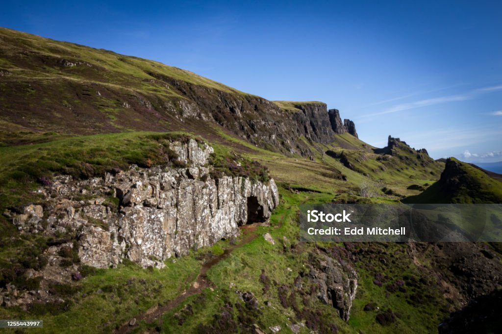 A view over Scottish mountains A view over Scottish mountains, from the hiking paths of The Quiraing, Isle of Skye, Scotland, UK Beauty Stock Photo