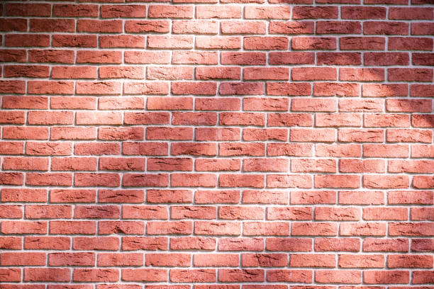 istock Red brick wall for surfaces with lines and textures on the surface 1255444523