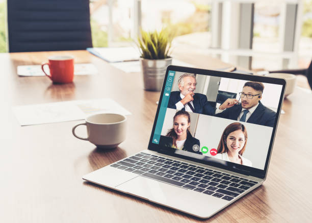 istock Video call business people meeting on virtual workplace or remote office 1255450398